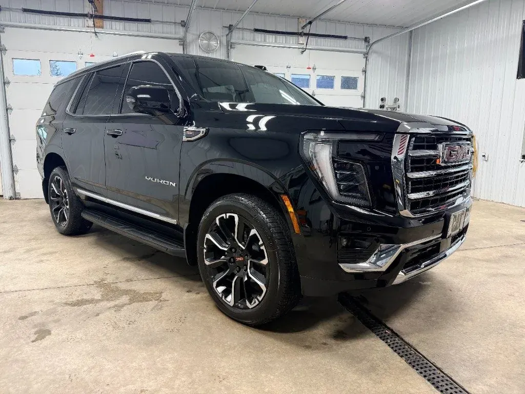 Black GMC Yukon after window tint at Black Label Tint