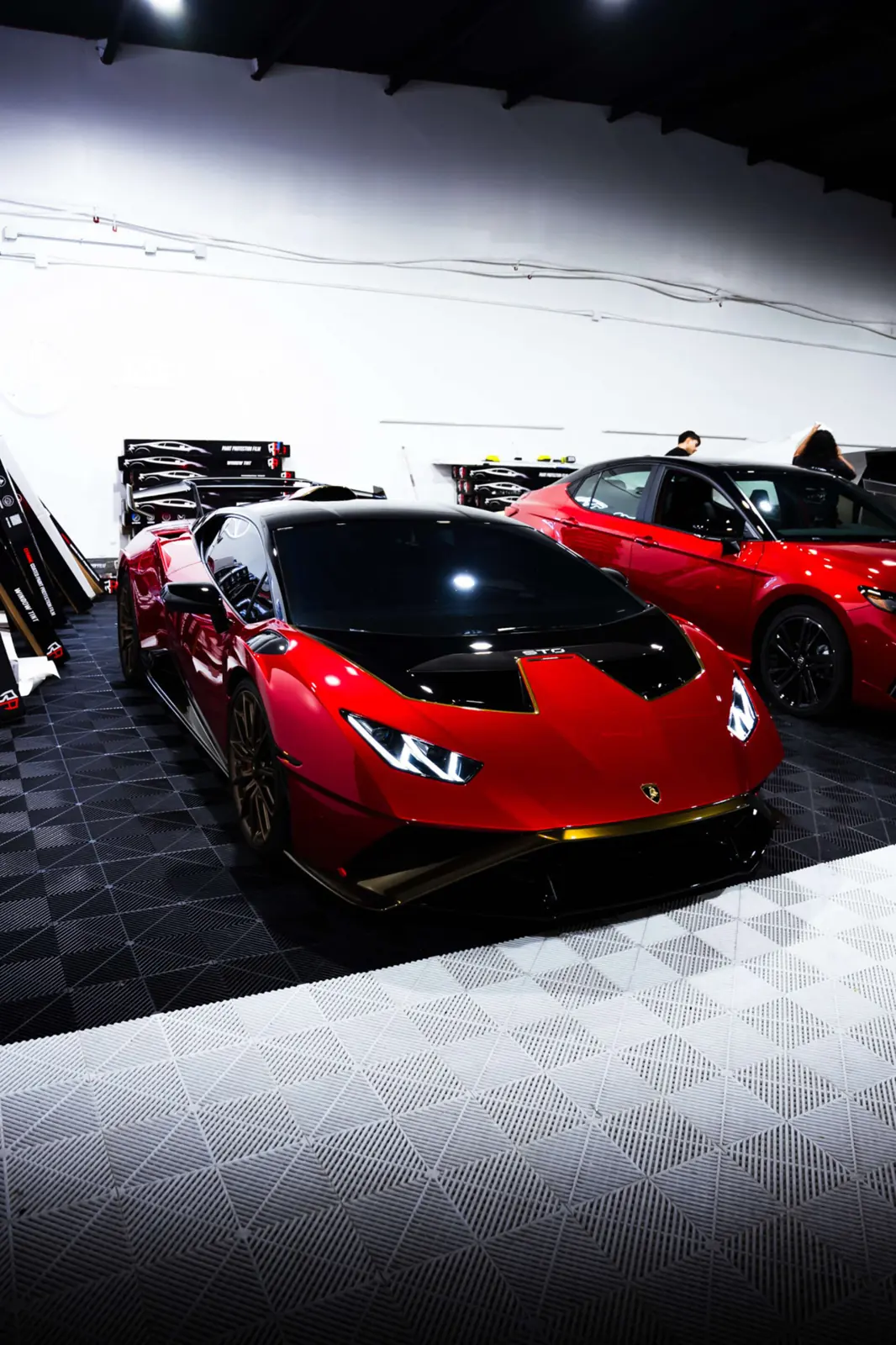 Red supercar with a deep ceramic gloss at JLE Customs