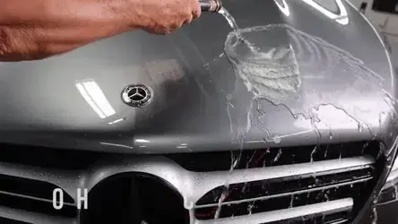 Water sheeting off a ceramic coated Mercedes hood