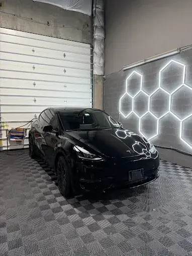 Black Tesla Model Y after a full detail