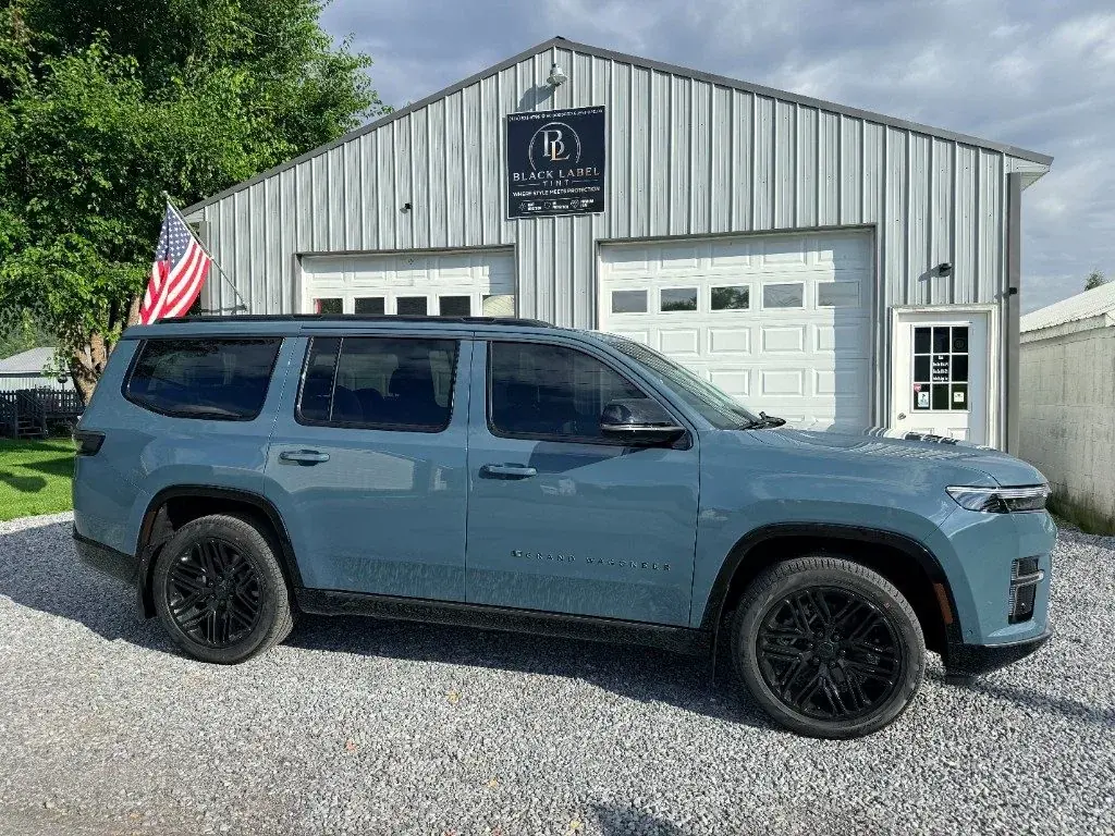 Jeep Wagoneer with tinted windows outside Black Label Tint